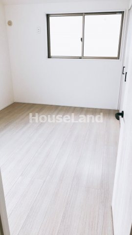 ヴィラージュ野崎の洋室