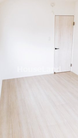 ヴィラージュ野崎の寝室