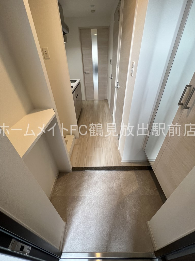 大阪市城東区鴫野東２丁目の賃貸マンションの玄関