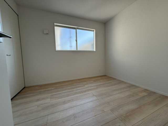 西区竜が岡5丁目①号棟　新築の洋室