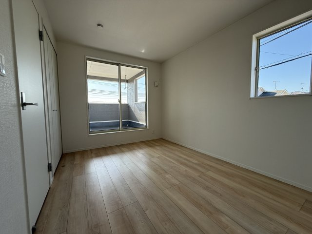 西区竜が岡5丁目①号棟　新築の洋室