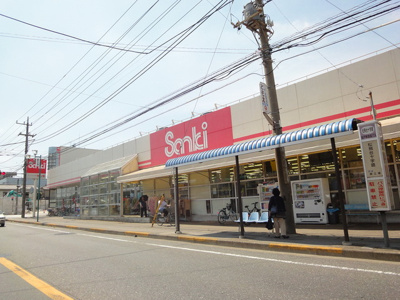 サンキ松飛台店 徒歩13分。ショッピングセンター 970m