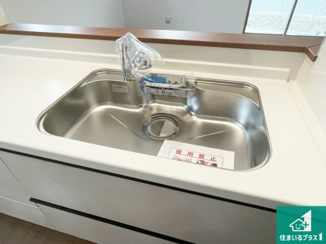 伊丹市松ケ丘　新築一戸建ての設備|蛇口の先端に浄水器を内蔵しています！原水と浄水、お湯と冷水、シャワーの切替えがワンタッチなので用途によって使い分けられます。