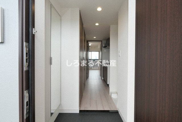 プレサンスOSAKA東中本エシデルの玄関