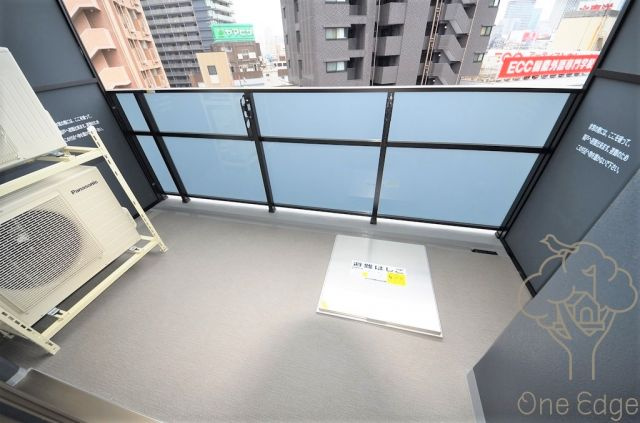 エス・キュート梅田中崎町のバルコニー