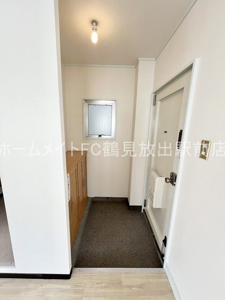 メゾンドリュウ鶴見の玄関