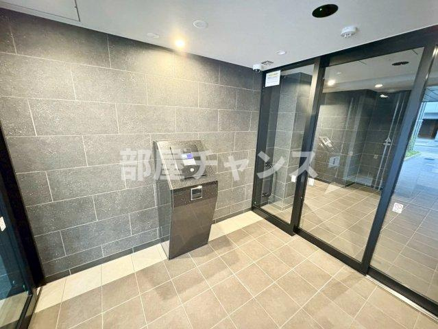 プレサンスレイズ金山アクスのエントランス