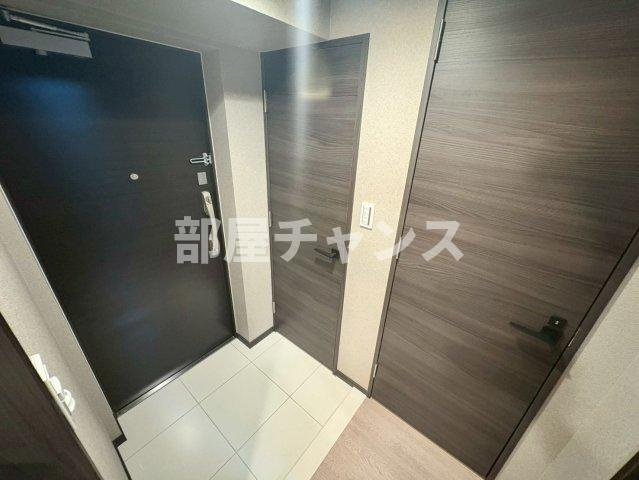 プレサンスレイズ金山アクスの玄関