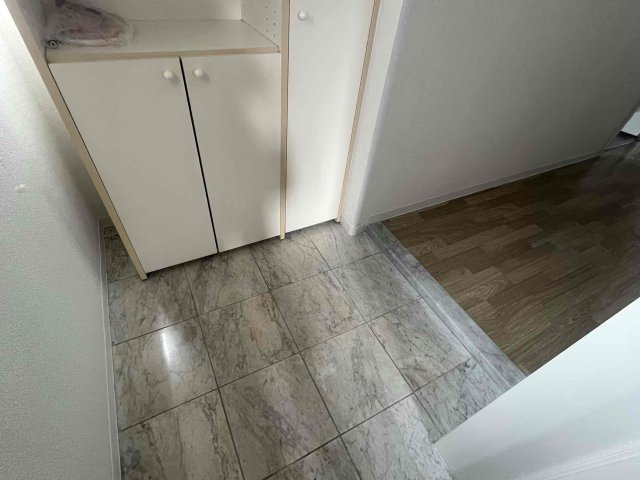 朝日プラザ野里北野町の玄関