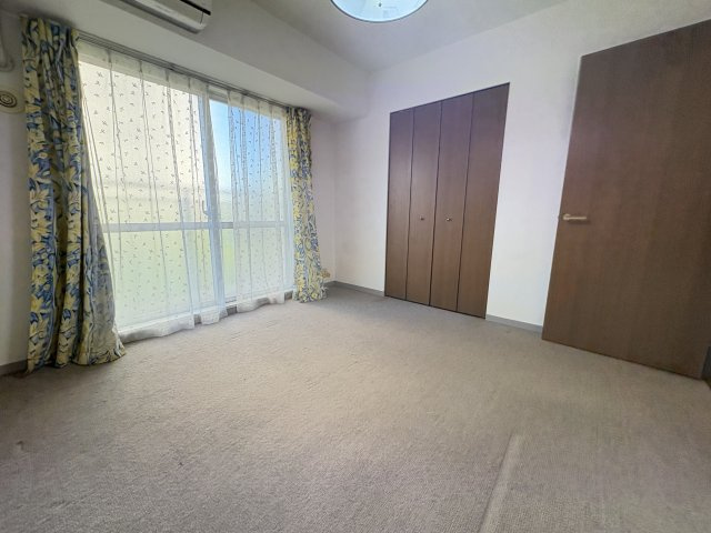 グランコリーナ西神南10番館の洋室