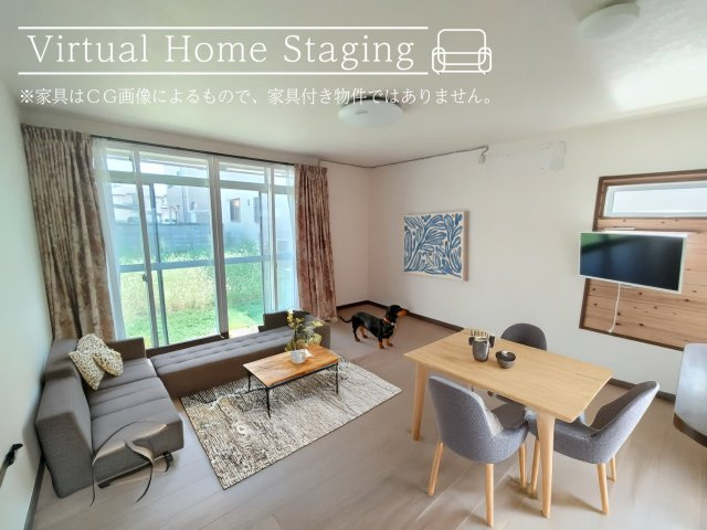 喜沢M戸建ての居間・リビング|南庭に面した明るいLDK　家具配置イメージ　※家具・ペットはAI生成です