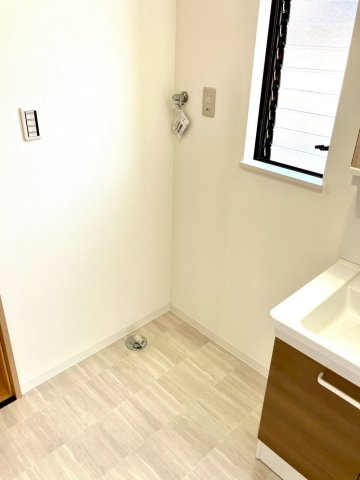 丸亀市田村町　水回り充実の再生住宅のランドリースペース