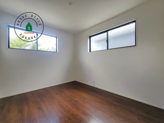 福津市福間南5丁目第6-2棟（2号棟）の内観：施工例|落ち着いた色調の洋室です。