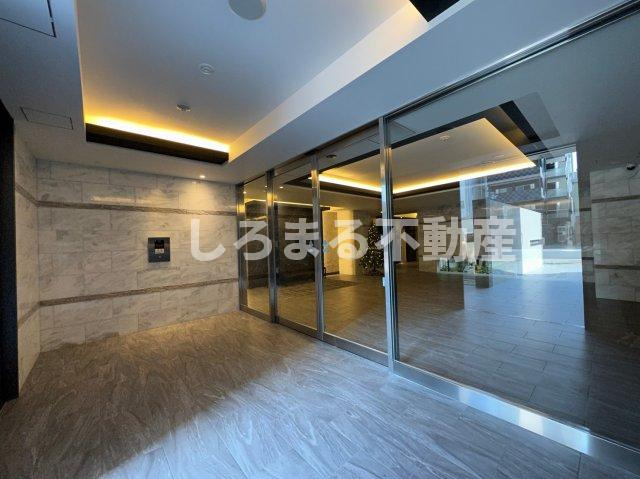 スプランディッド九条駅前のエントランス