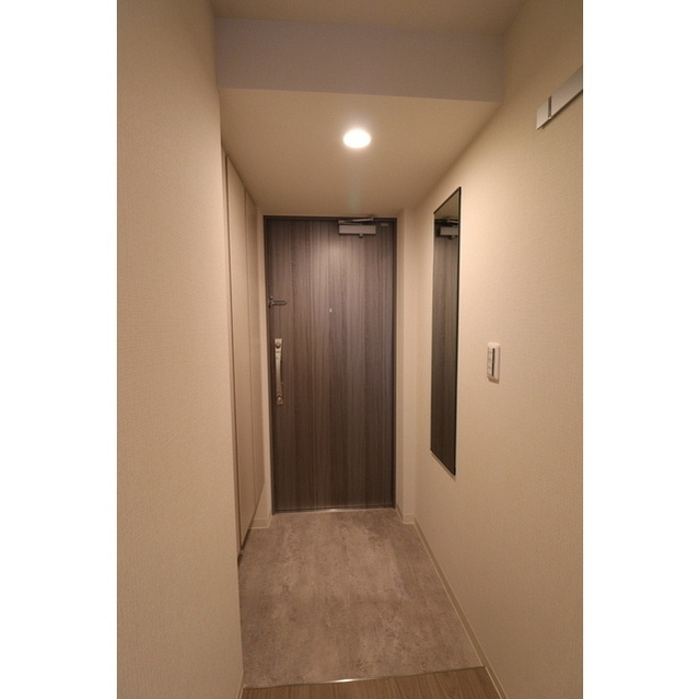 コンフォリア・リヴ北久宝寺Qの玄関