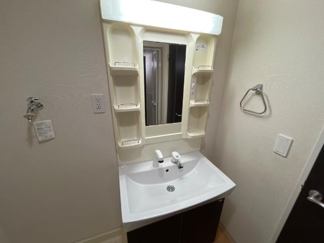 ガーデンハイム椿の洗面所|洗髪洗面化粧台