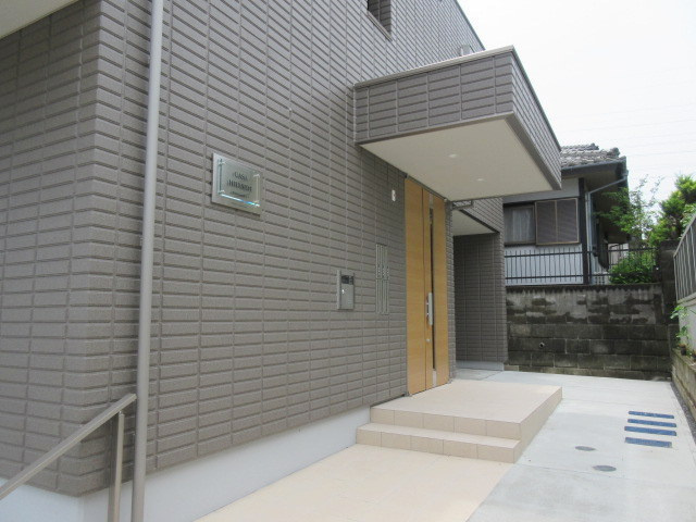 ＣＡＳＡ　ＨＩＬＬＳＩＤＥ　カーサヒルサイドのエントランス