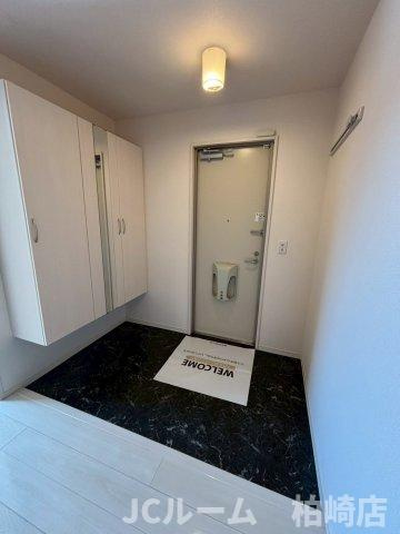 柏崎市桜木町のアパートの玄関