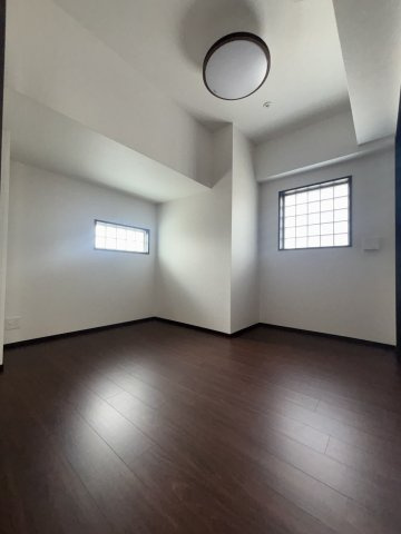 プレジオ日暮通の寝室