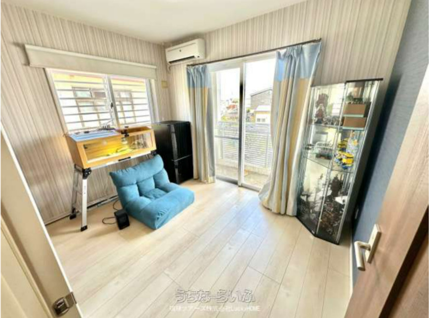 宜野湾市赤道2丁目戸建ての洋室