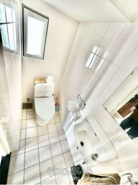 宜野湾市赤道2丁目戸建てのトイレ