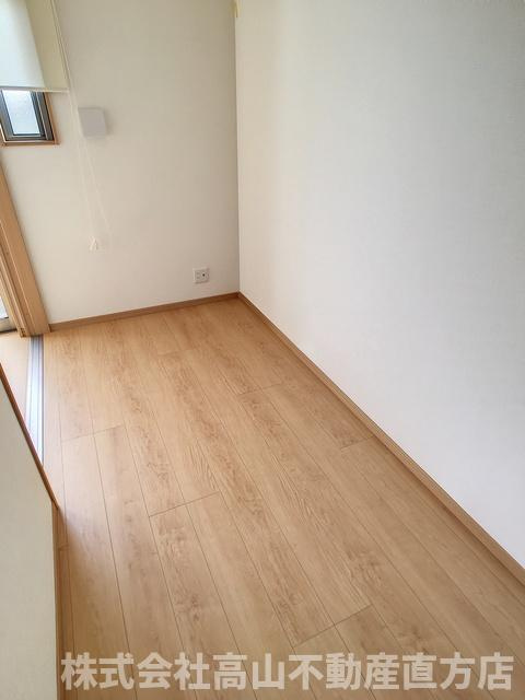 サンシティ直方の洋室