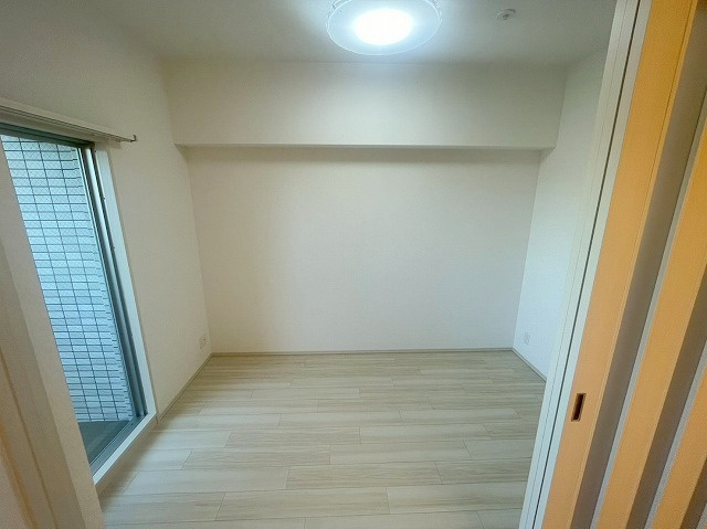 プレジオ西中島ASIANの寝室