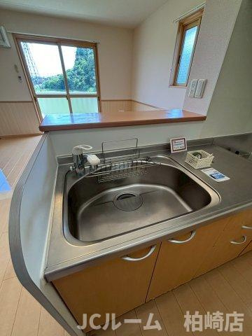 柏崎市大字藤井のアパートのキッチン