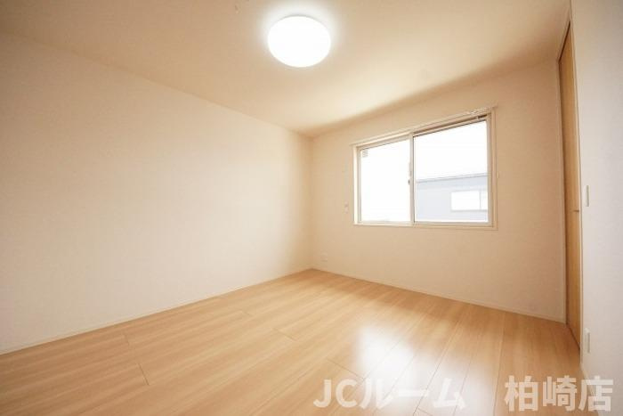 柏崎市半田１丁目のアパートの寝室