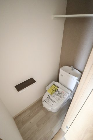 大阪市城東区野江３丁目の賃貸マンションのトイレ