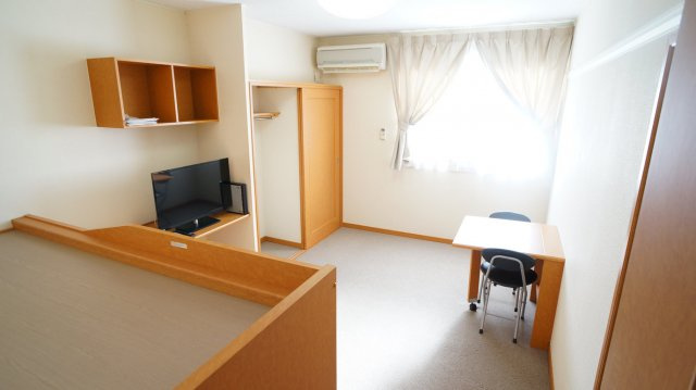 レオパレスＦｕｍｉｎの居間・リビング