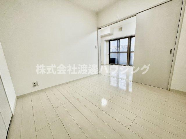 グランシャリオ江坂の洋室