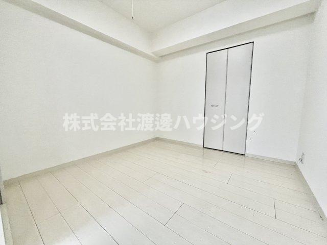 グランシャリオ江坂の洋室