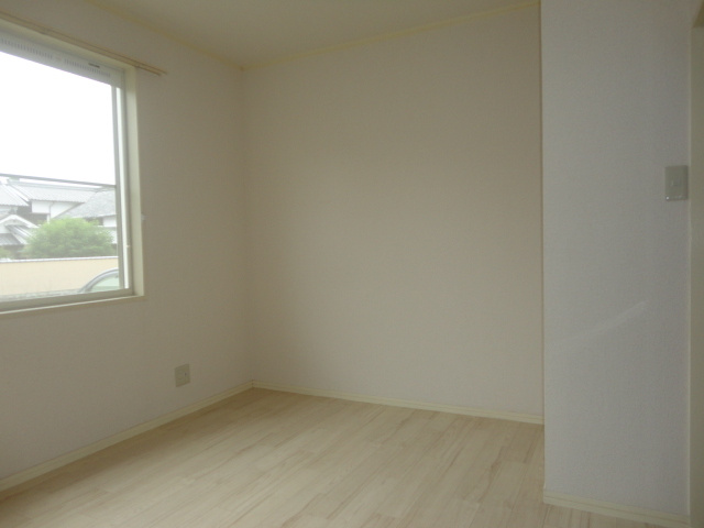 ハイツいかるが法隆寺の寝室