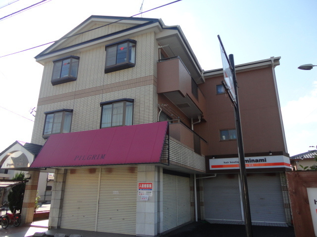 北葛城郡河合町星和台２丁目の店舗一部の外観