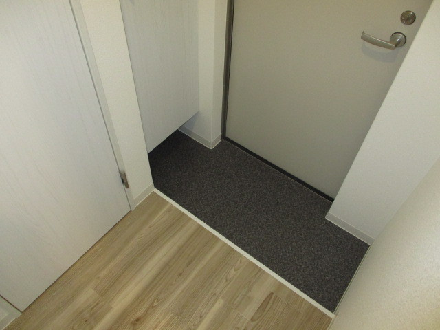 ジーメゾン郡山リアンの玄関