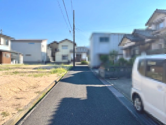 敦賀市市野々町一丁目60坪売地（北区画）の前面道路含む現地写真