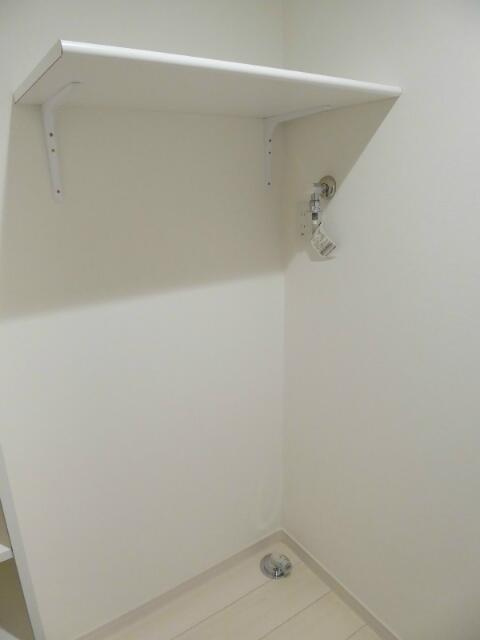 グランソレイユ大倉山の設備|洗濯機置き場は嬉しい棚付き！