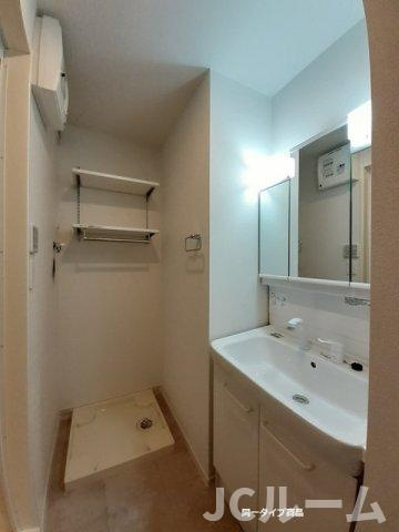 柏崎市半田３丁目のアパートの洗面所