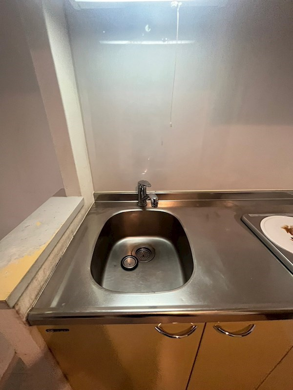 きさらぎコーポのキッチン|コンパクトなキッチンで掃除もラクラク