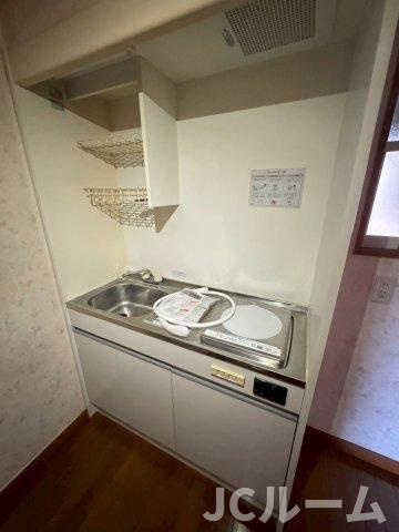 柏崎市大字安田のアパートのキッチン