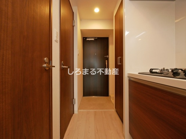 フォーリアライズ弁天町ノビアの玄関