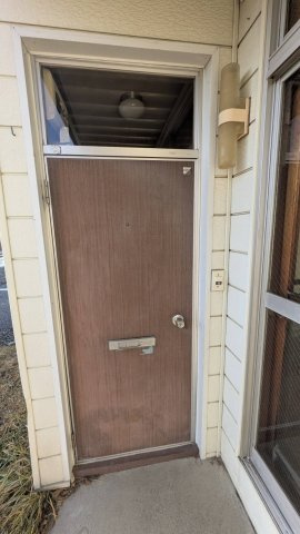 松本マンションの玄関