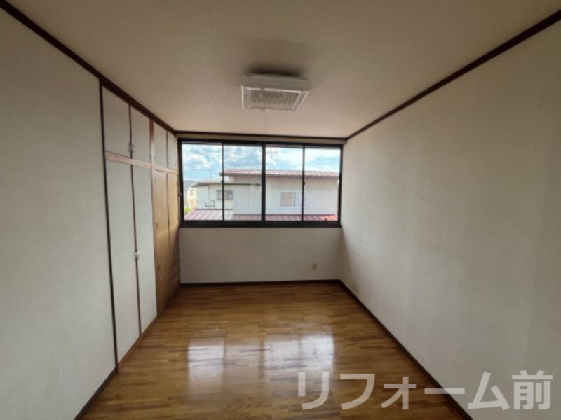 山形市あかねヶ丘二丁目2-7の洋室