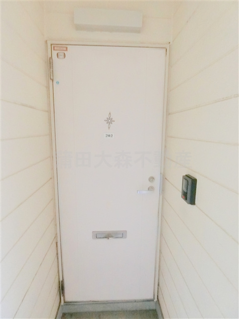 ファミールカツラの玄関