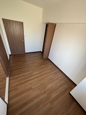 リージェントパーク廿日市駅前の洋室