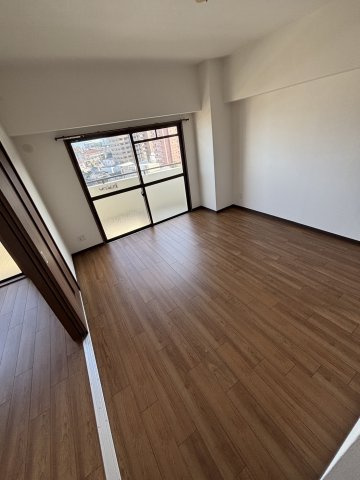 リージェントパーク廿日市駅前の洋室