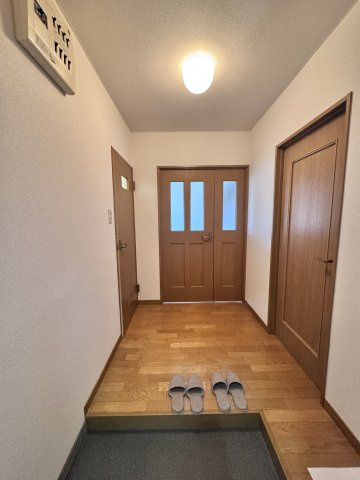 ハーモニータカノの玄関