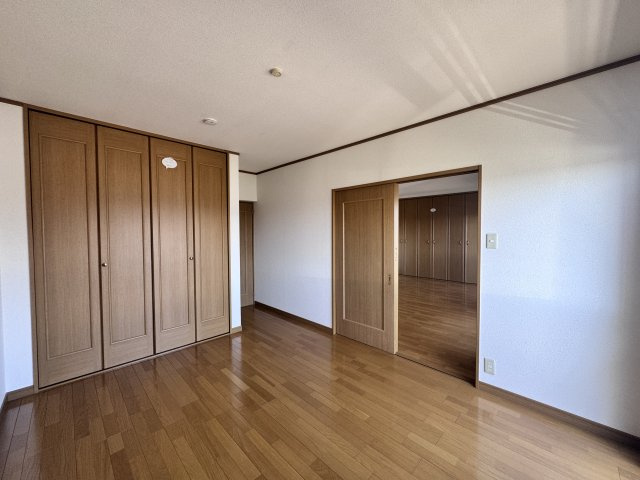 ハーモニータカノの寝室