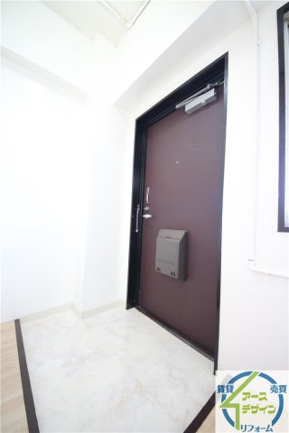 昭和パレス魚住の玄関